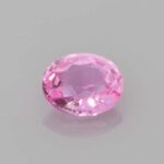 0.56ct Oval Padparadscha Sapphire, view 1