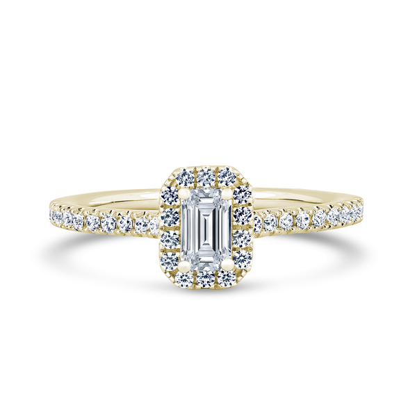 Pavé vs channel-set diamond shoulders shown on a Kinzy emerald engagement ring