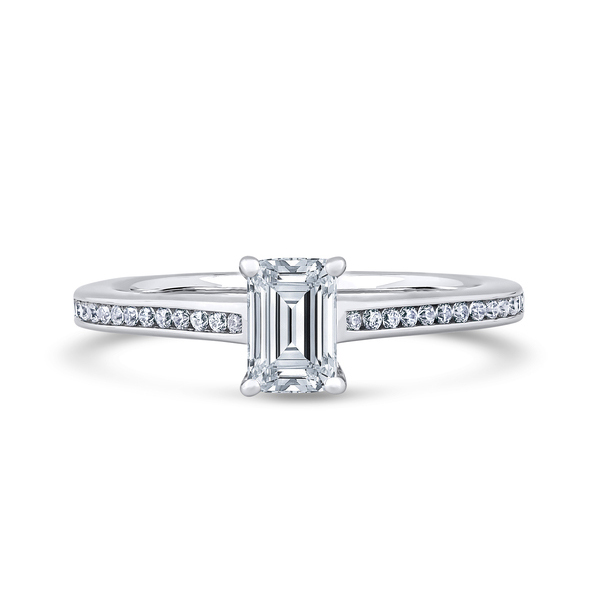 Kinzy London emerald-cut channel-set shoulder engagement ring in platinum