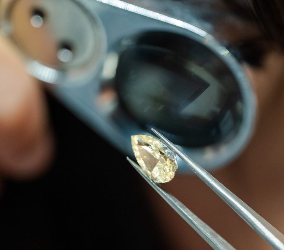 A diamond being examined by a Kinzy jeweller