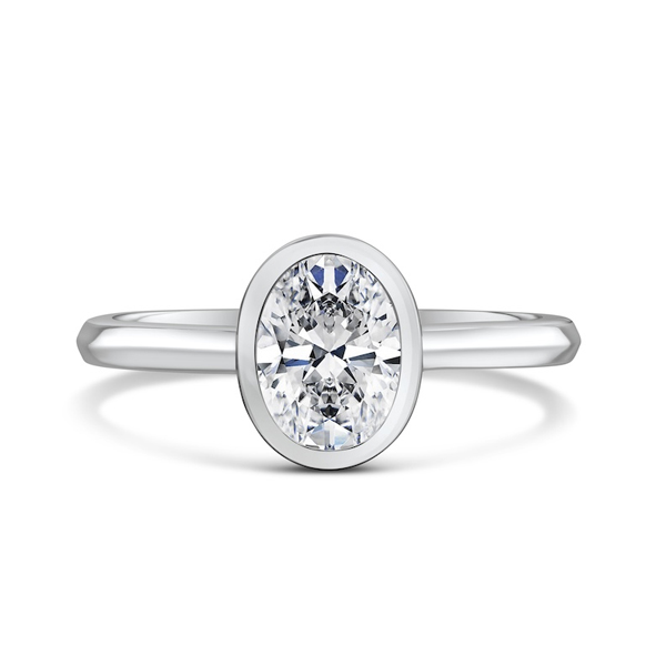 Kinzy London oval bezel solitaire engagement ring in platinum