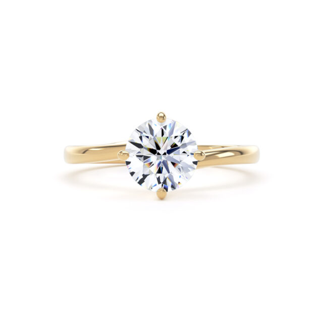 Round East–West Solitaire in 18k yellow gold