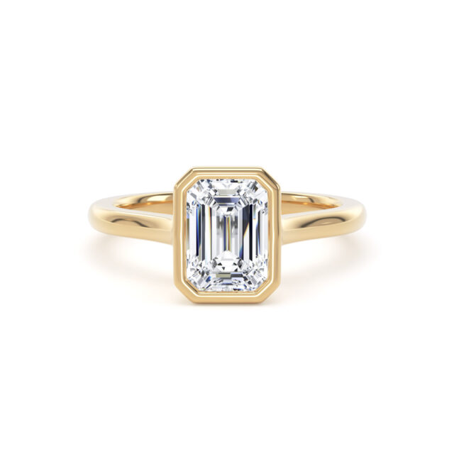 Emerald Bezel Solitaire in 18k yellow gold