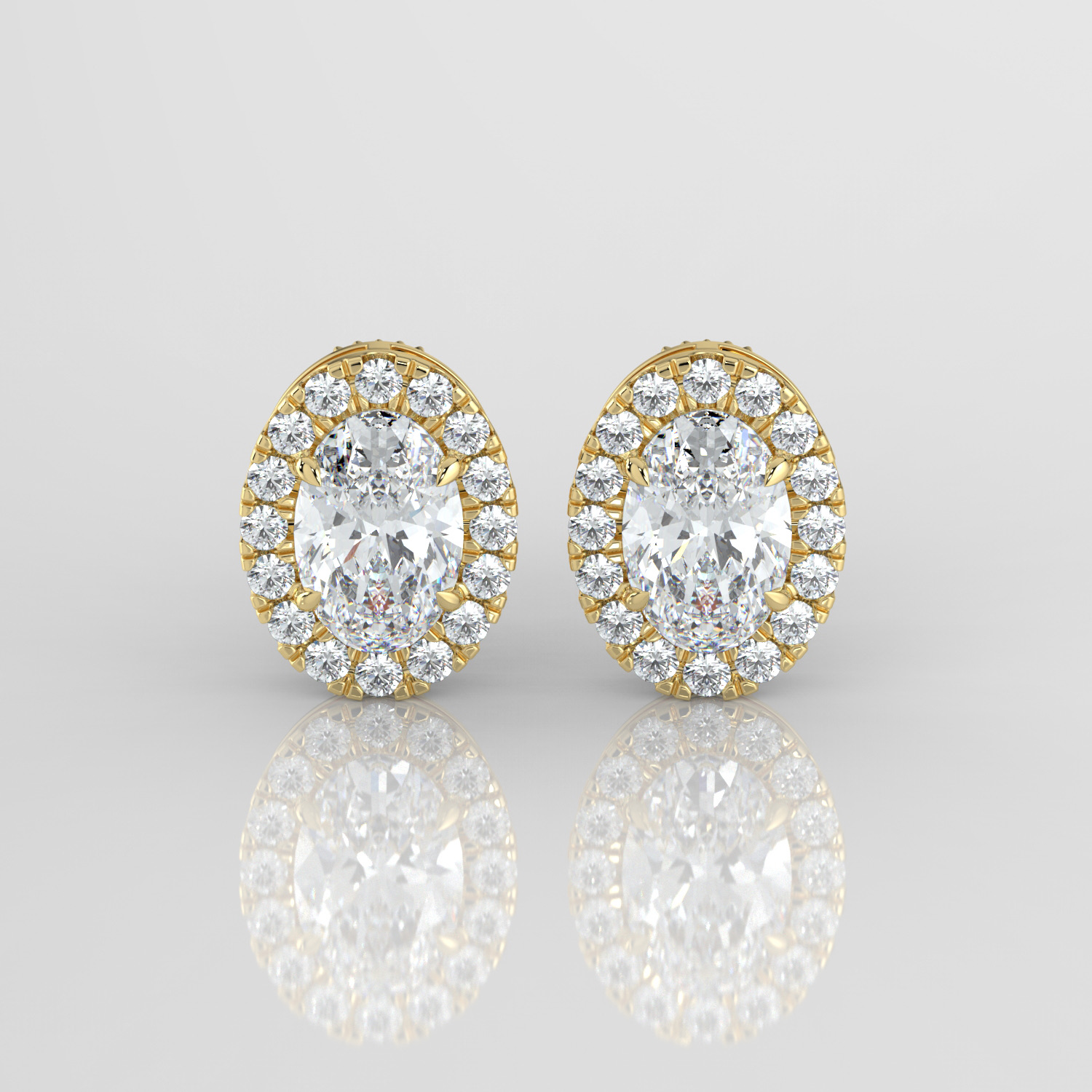 Oval cut diamond halo earrings, yellow gold, front view