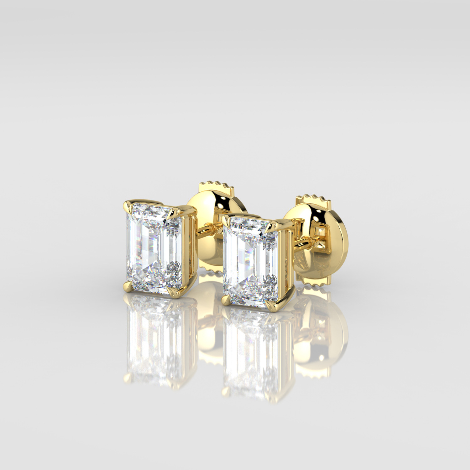 Radiant cut diamond stud earrings, yellow gold, three-quarter view