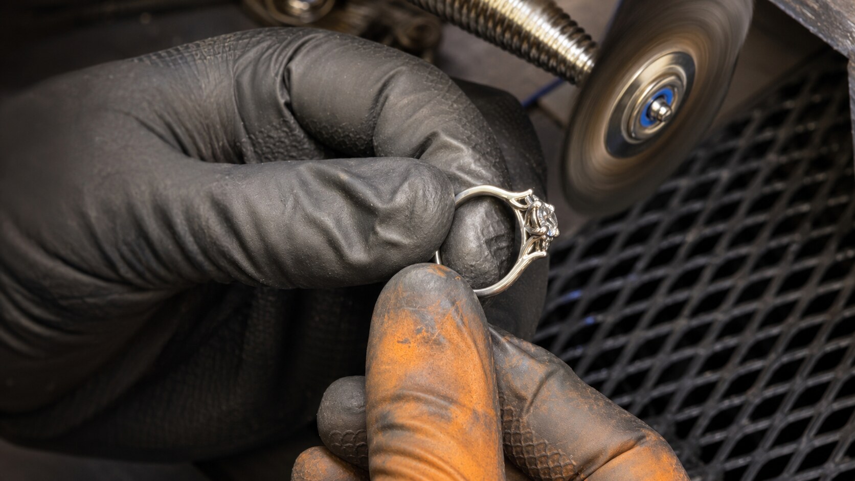 A Kinzy ring being professionally polished and refinished in Hatton Garden