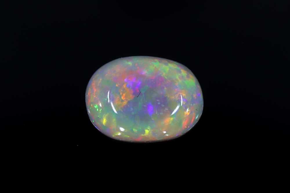 0.65ct Cabochon Oval Black Opal