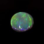 0.65ct Cabochon Oval Black Opal, view 1