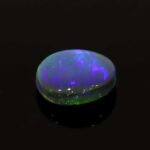 0.65ct Cabochon Oval Black Opal, view 2