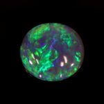 1.28ct Cabochon Oval Black Opal, view 1