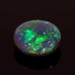 1.28ct Cabochon Oval Black Opal, view 2