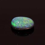 0.62ct Cabochon Oval Black Opal, view 2