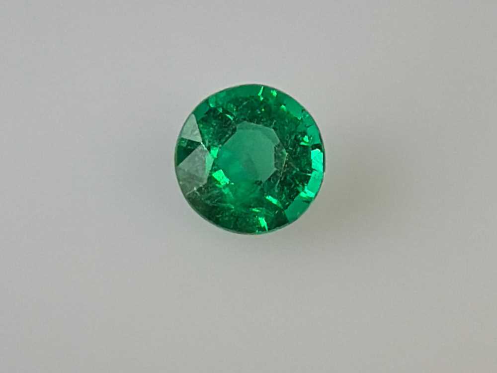 0.64ct Round Emerald