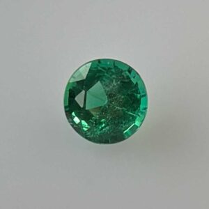 0.58ct Round Emerald