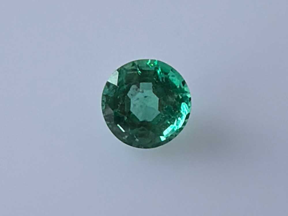 0.67ct Round Emerald