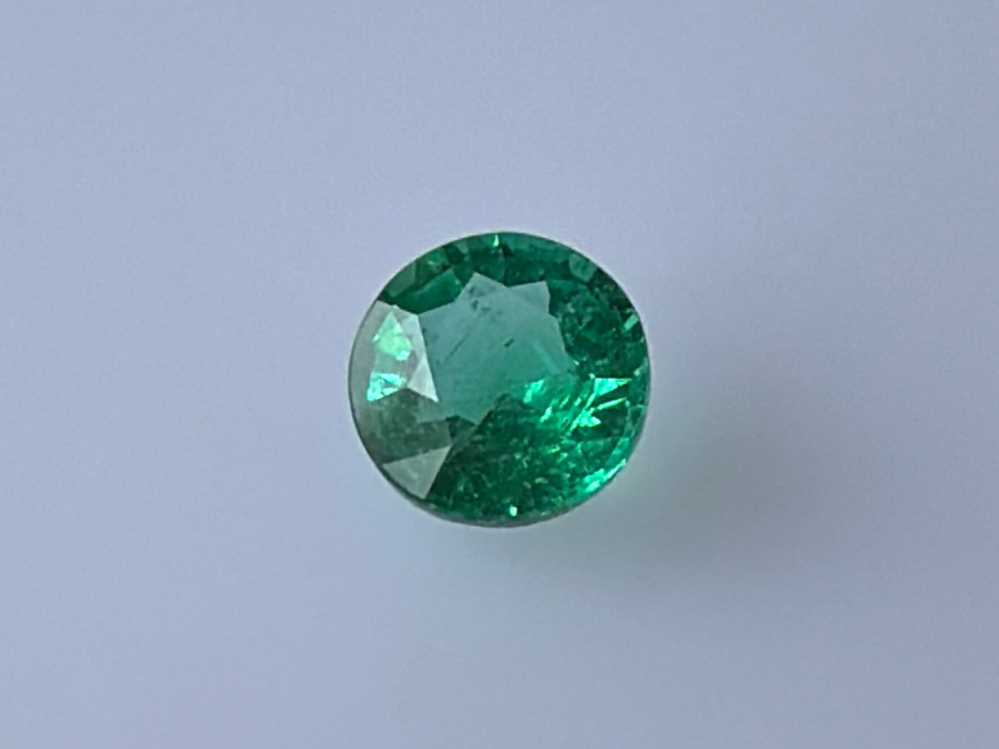 0.64ct Round Emerald
