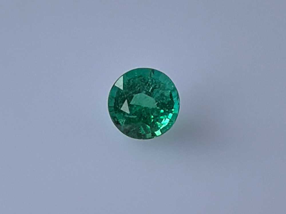 0.77ct Round Emerald