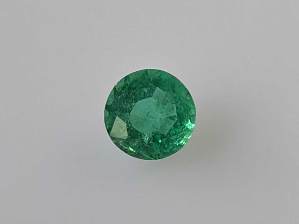 0.58ct Round Emerald