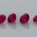 0.303ct Round Ruby, view 2