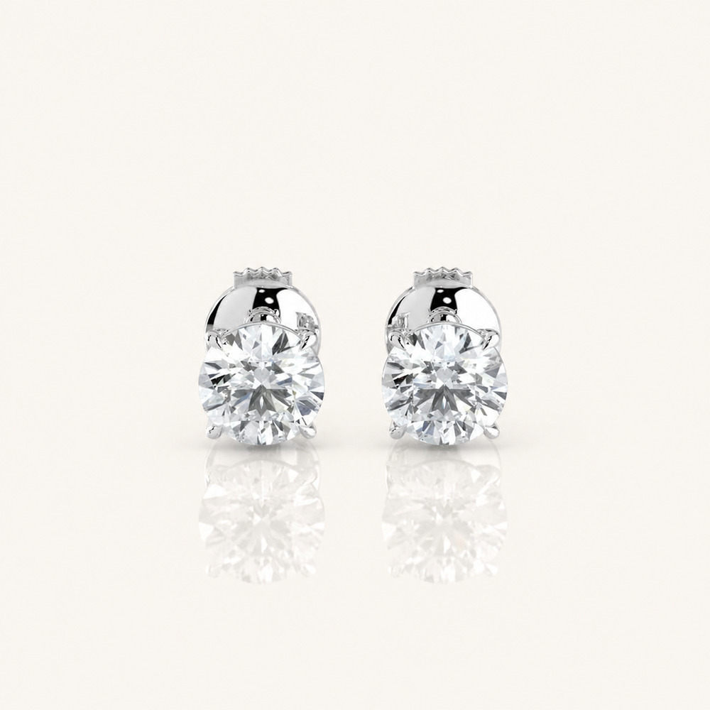 Round solitaire diamond earrings by Kinzy London