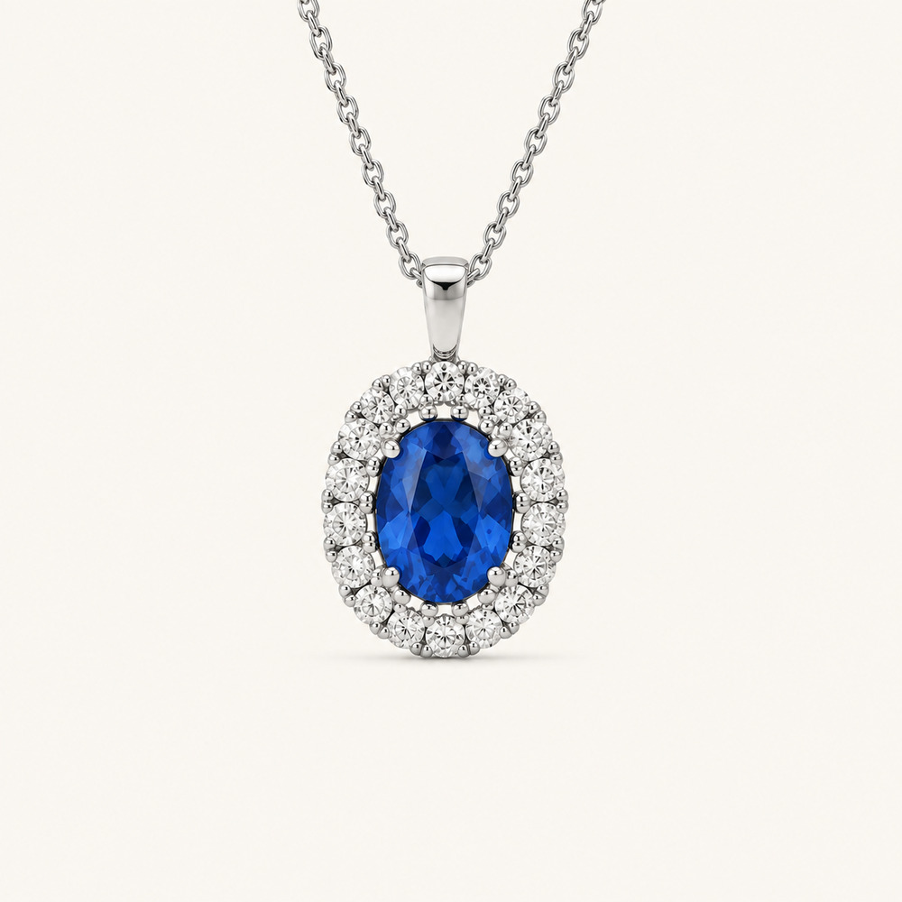 Oval blue sapphire and diamond halo pendant