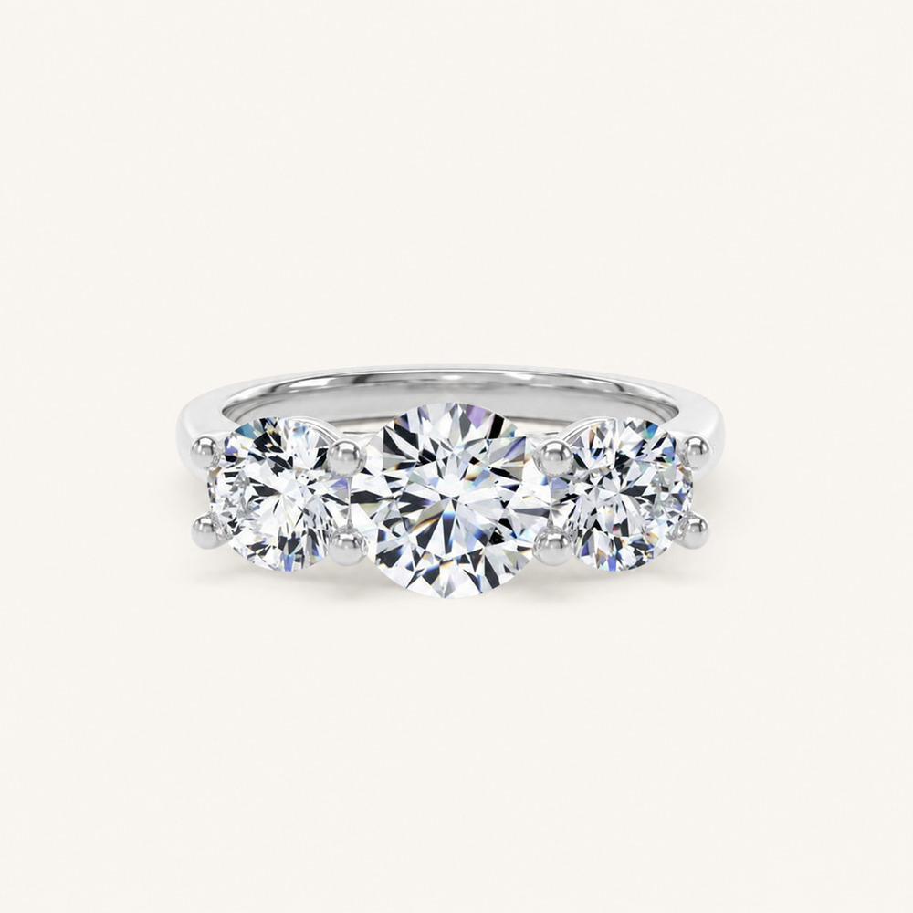 Platinum trilogy diamond ring by Kinzy London