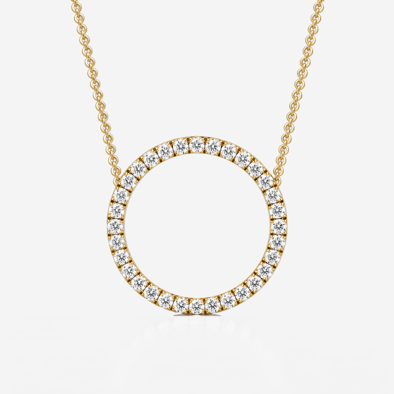 Open-circle diamond pendant in yellow gold