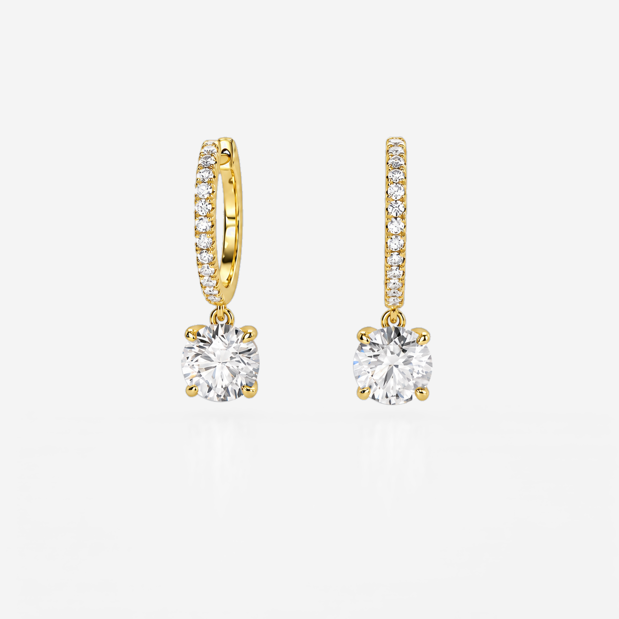 Round diamond drop earrings in yellow gold