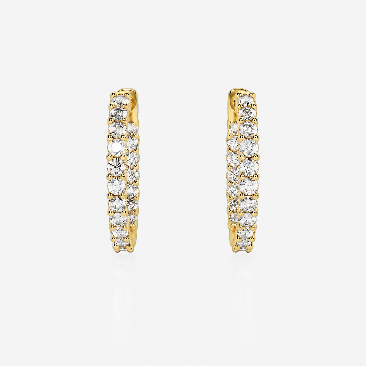 Diamond hoop earrings in yellow gold