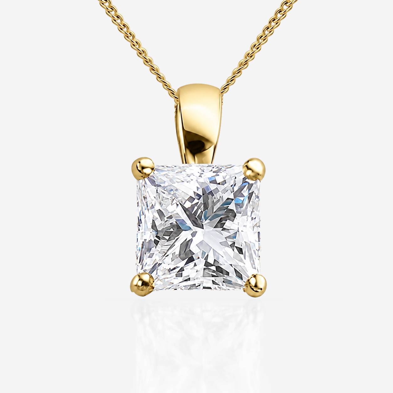 Princess diamond solitaire pendant in yellow gold