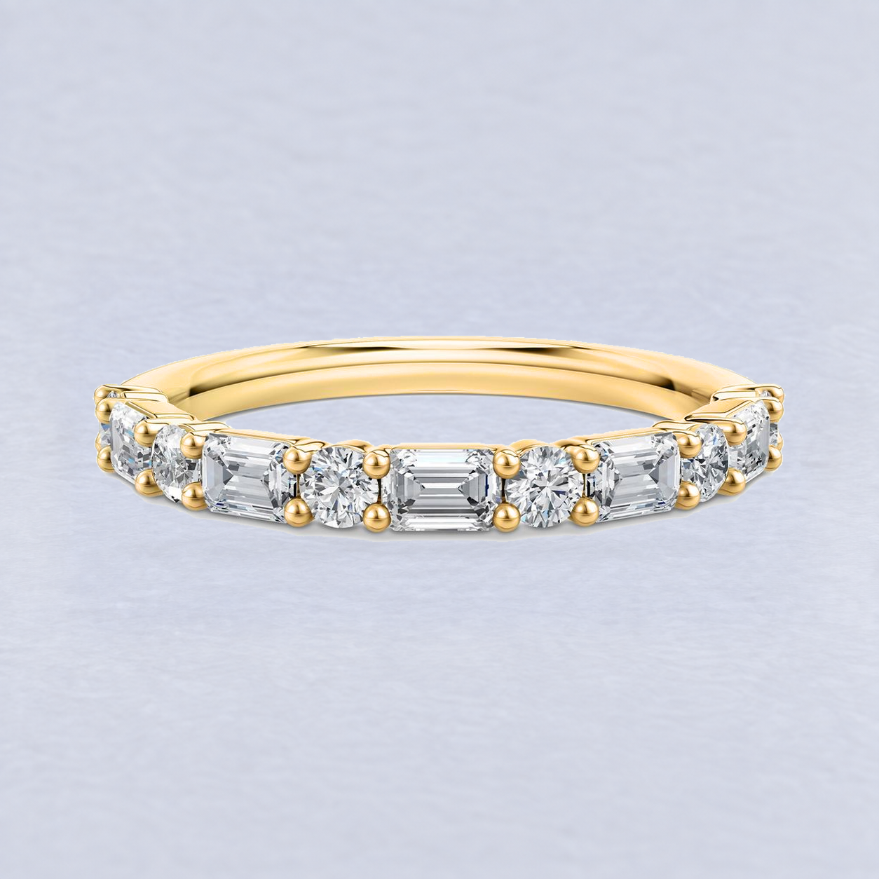 2mm Emerald and Round Diamond Wedding Band, shaped in 9ct Yellow Gold