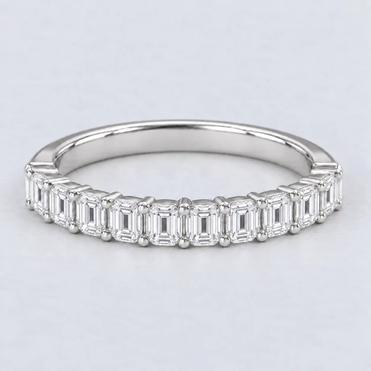Emerald Shared Prong Diamond Eternity Ring, half eternity in Platinum