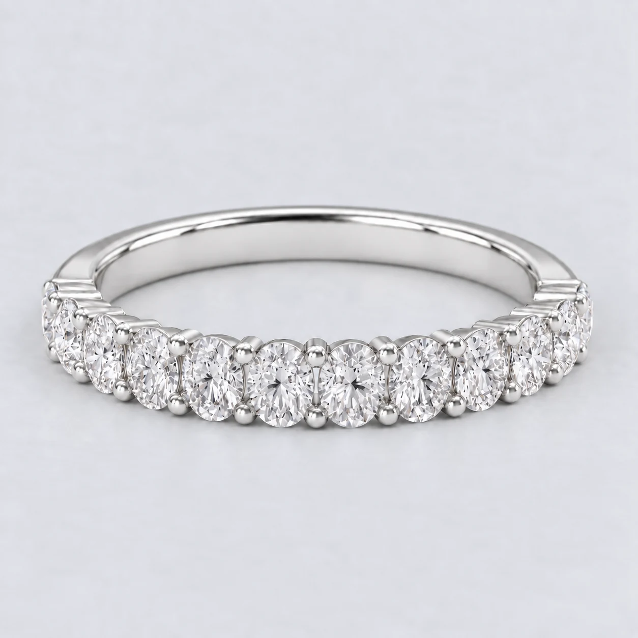 Oval Shared Prong Diamond Eternity Ring, half eternity in Platinum