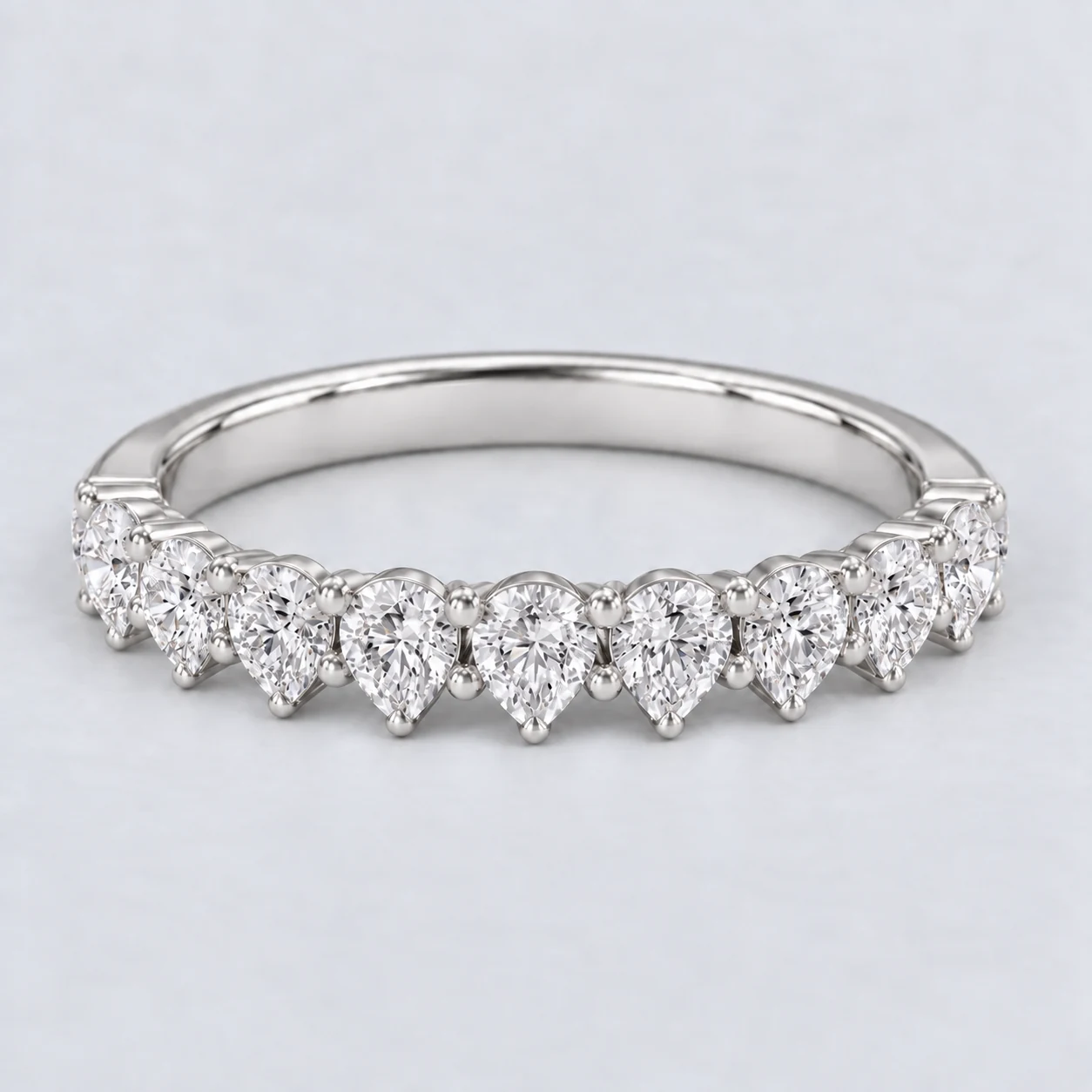 Pear Shared Prong Diamond Eternity Ring, half eternity in Platinum