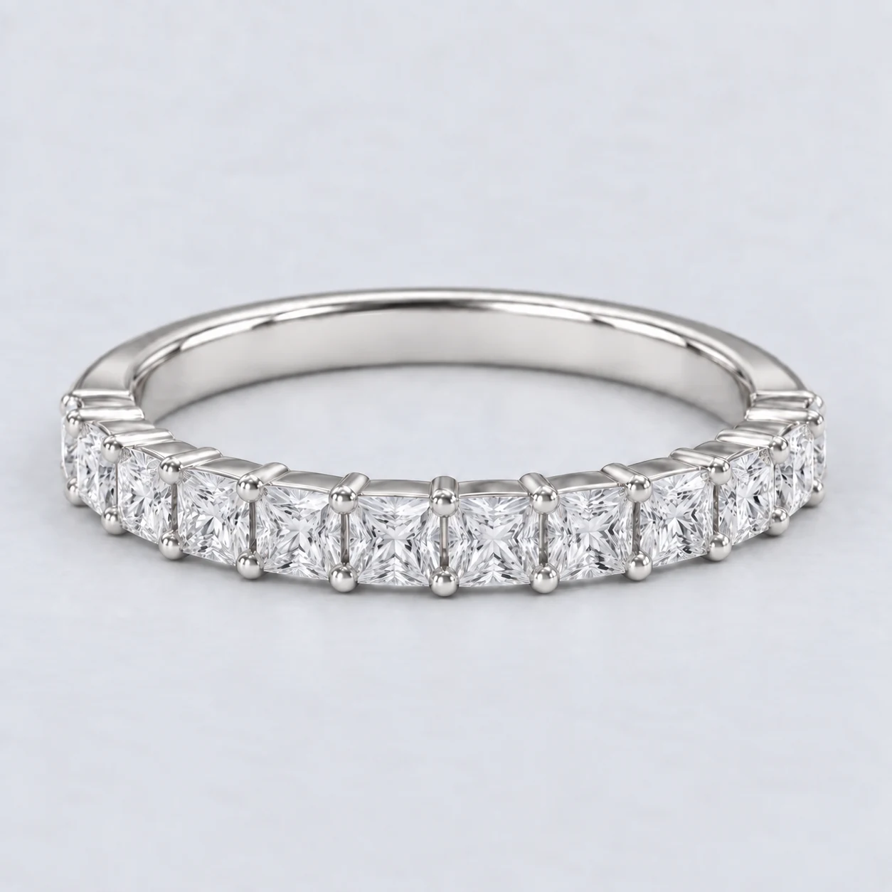 Princess Shared Prong Diamond Eternity Ring, half eternity in Platinum