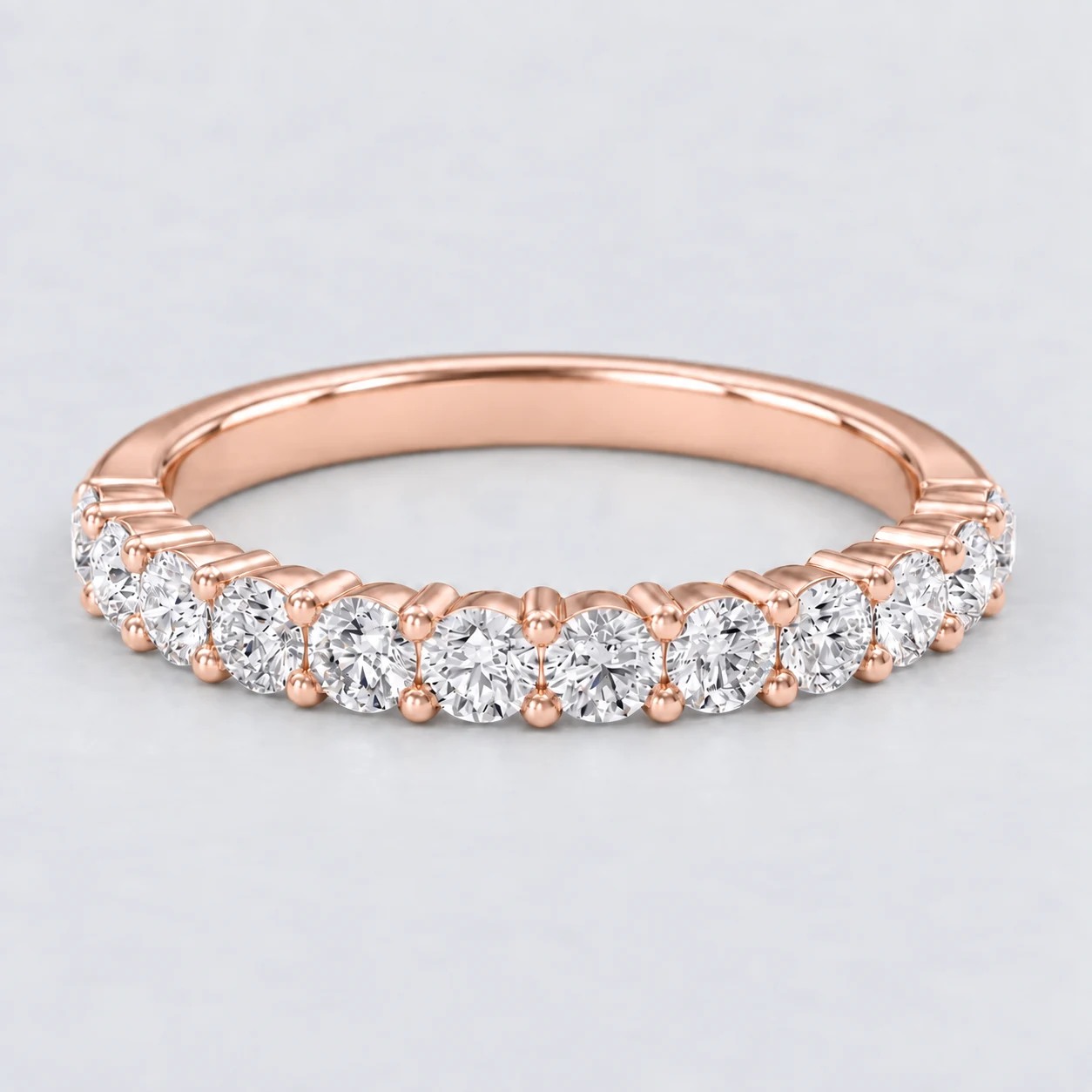 Round Shared Prong Diamond Eternity Ring, half eternity in 9ct Rose Gold