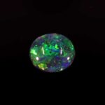 0.51ct Cabochon Oval Black Opal, view 1