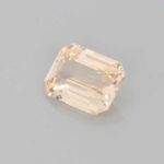 1.59ct Emerald Cut Peach Sapphire, view 2