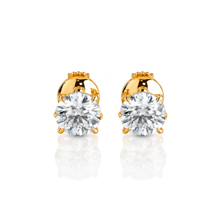 Round diamond stud earrings in yellow gold