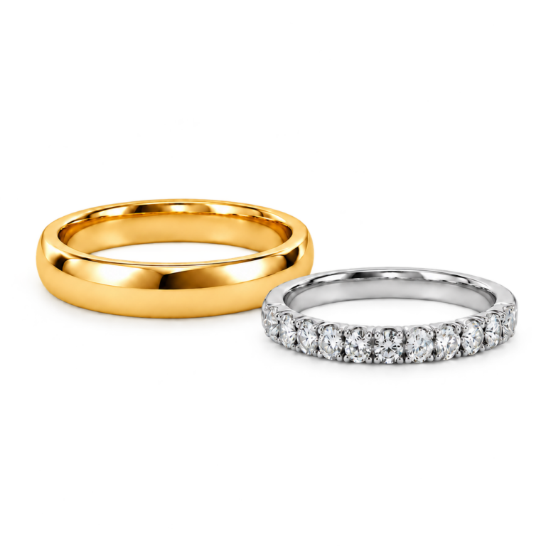 Yellow gold plain wedding band beside a white metal diamond wedding band