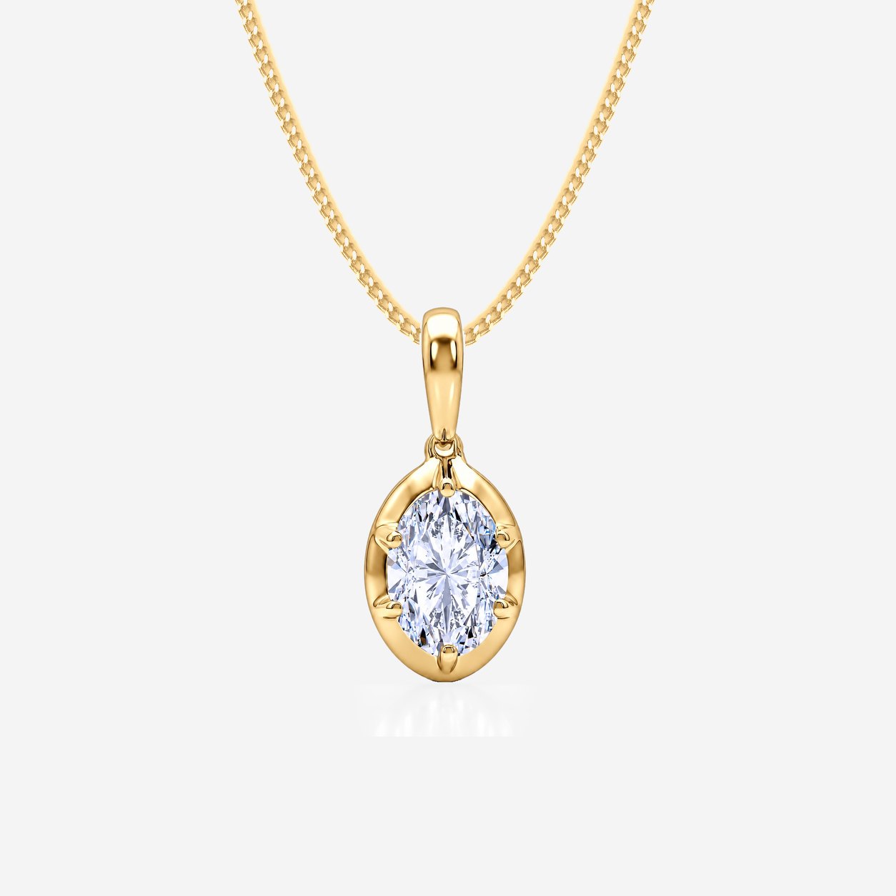 Six-claw oval diamond solitaire pendant with a matching yellow-gold diamond-cut curb chain.